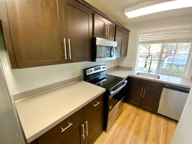 Photo - Large Updated 2 Bed, 1.5 Bath Townhouse w/ Washer & Dryer + Off-street Parking
