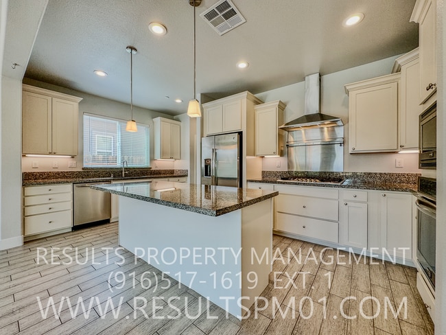 Building Photo - Looks like a model home! Upgraded 4 Bedroo...