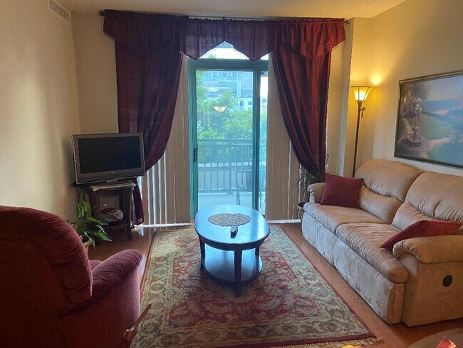 Living Room - 11700 Old Georgetown Rd Unit 203