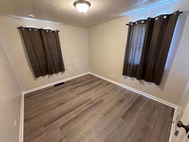 Photo - Recently updated 2-bedroom, 1-bath unit in a well-maintained Englewood fourplex w/ a shared yard!...