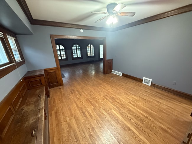 Photo - ? Updated 4BR/2BA Single-Family Home — Garage Parking, Water & Lawn Care Included ?