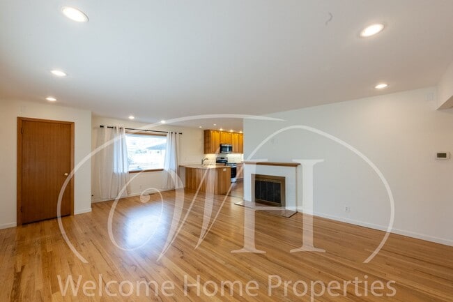 Photo - Spacious 5 Bedroom Home with Fenced Yard & Covered Parking