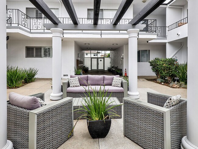 Shaded courtyard gazebo for relaxing or reading.