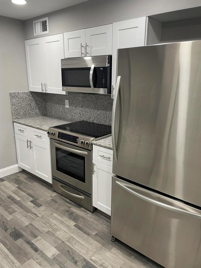 Building Photo - 2700 Coral Springs Dr Unit 104