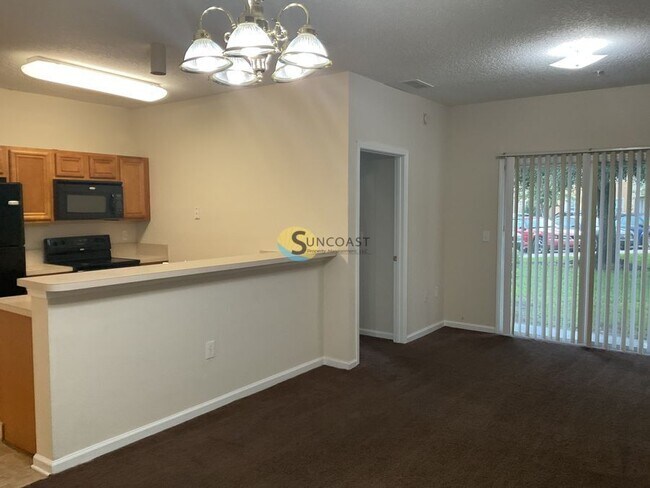 Photo - 6985 Ortega Woods Dr Unidad 3