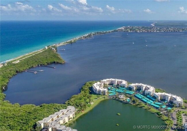 Building Photo - 5799 NE Island Cove Way Unit 1104