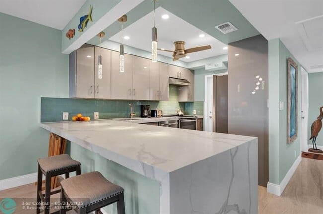 Building Photo - 2751 N Palm Aire Dr Unit 410 Rental