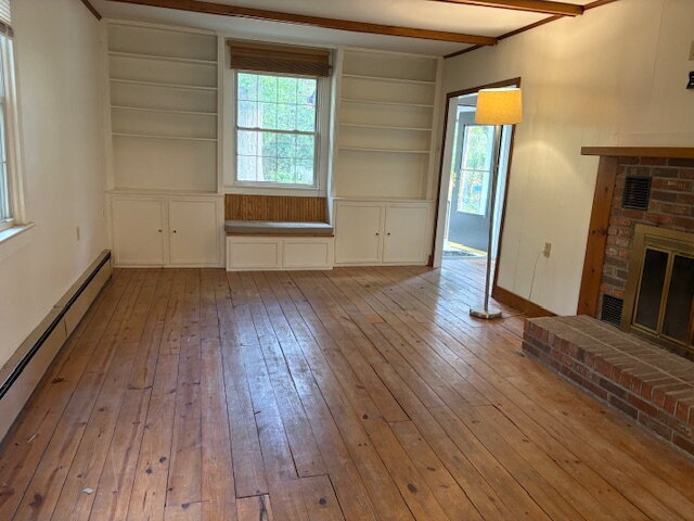 Photo - Hardwood floors and beautiful back yard in...