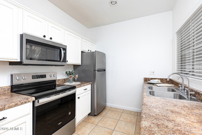 Building Photo - 11333 N 92nd St Unit 1042