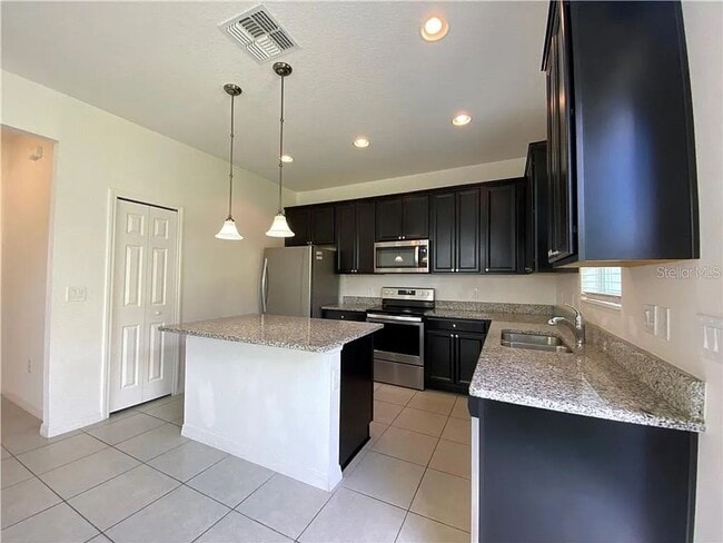 Photo - Beautiful End Unit Townhome Near Lake Nona w/ 2-Car Garage & Conservation Views!