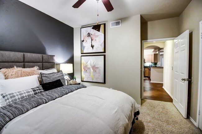 Spacious bedrooms with large windows for natural lighting, ceiling fan and plush carpet