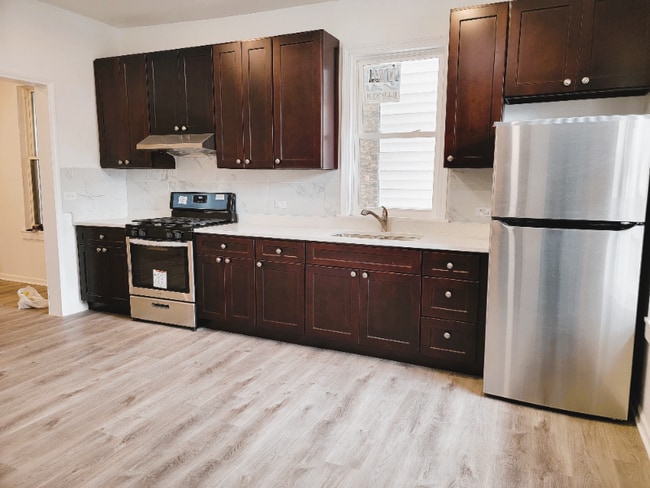 Photo - 307 W 24th St Unidad 1