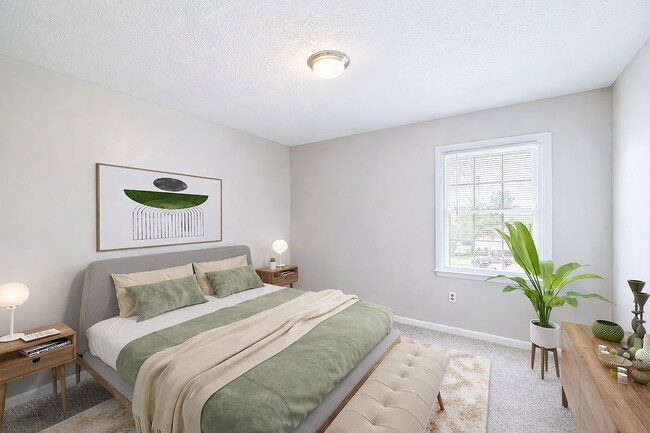 Serene neutral bedroom with sunlight