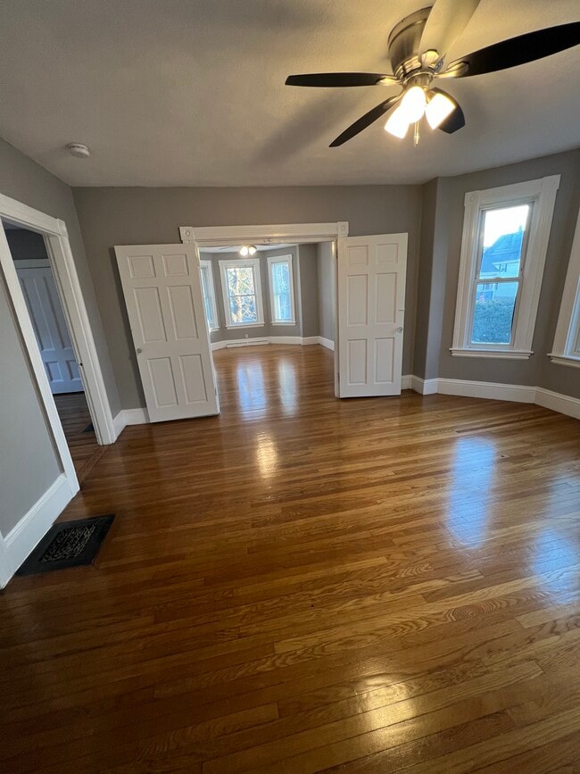 Living room facing 3rd bedroom - 24 Archer St Unit 1