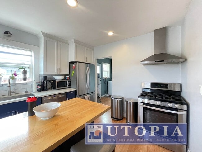 Photo - Beautiful 2Bed/1Ba Home on Large Corner Lot with 2-Car Garage Unit Front House