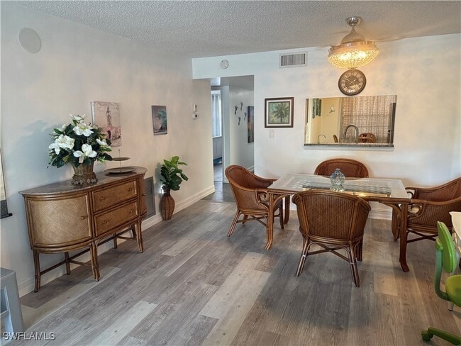 Building Photo - 5535 Rattlesnake Hammock Rd Unit 104