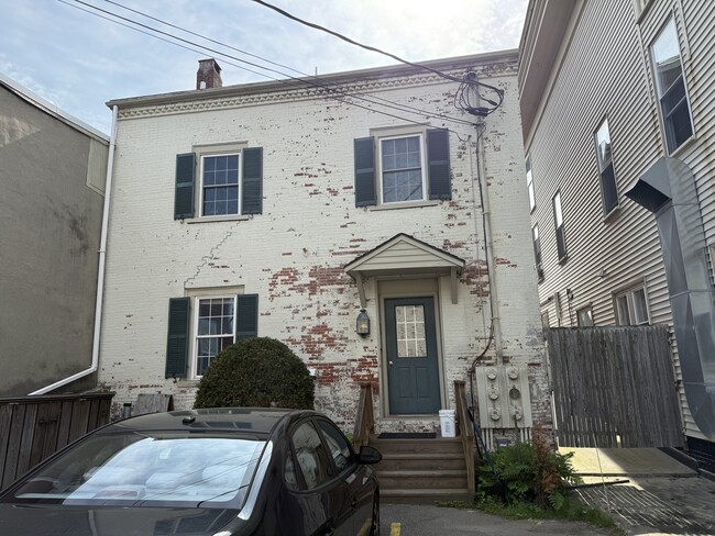 Unit parking and entry - 111 Water St Apartments Unit 1