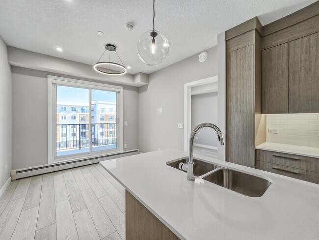 Photo - 63 Corner Glen Crois. NE Unit 1421