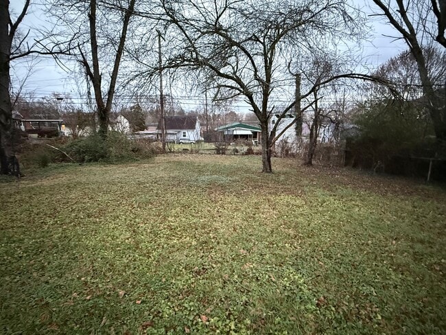 Photo - Updated 4BR Home with Finished Basement & Level Yard