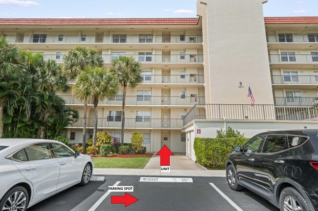 Building Photo - 3871 Via Poinciana Unit 104