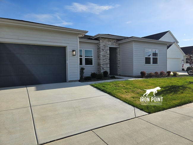 Photo - Brand New 4bed/3 bath home w/office, 2 car extended bay garage & all appliances included.