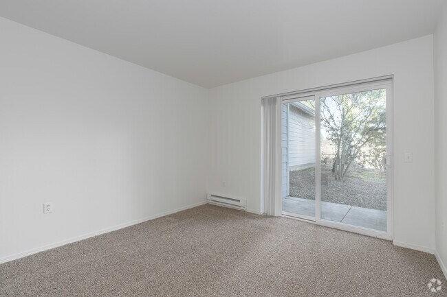 3BR, 2BA - 1,185SF - Primary Bedroom - Quatama Village Apartments