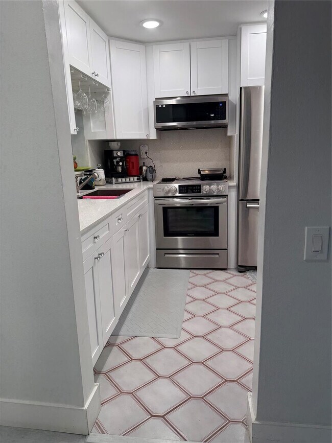 Photo - 9360 Lime Bay Blvd Unit 202