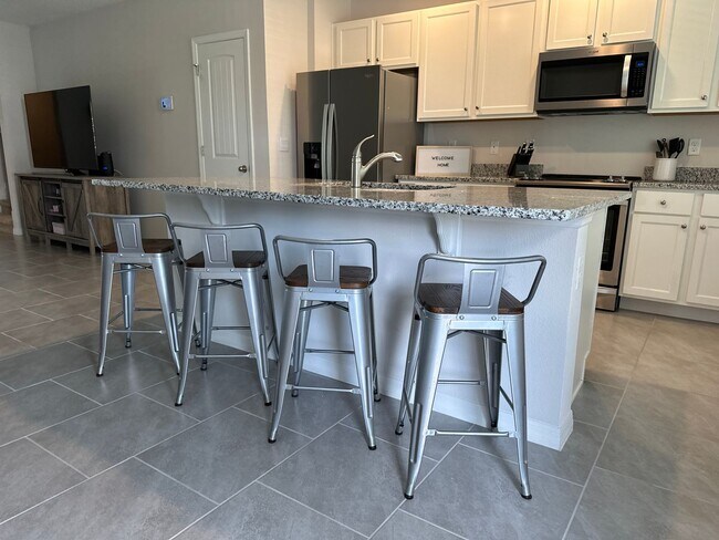 Photo - Resort Style Living! Stunning 3/2.5 Townhome in Waterleigh! Available April!