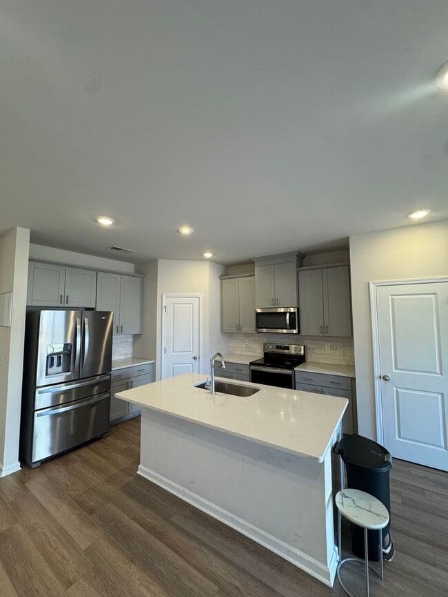 Photo - Beautiful 3BR 2.5 Townhouse w/ 2-Car Garage • EV Plug • Quartz Island • End Unit in Charlotte