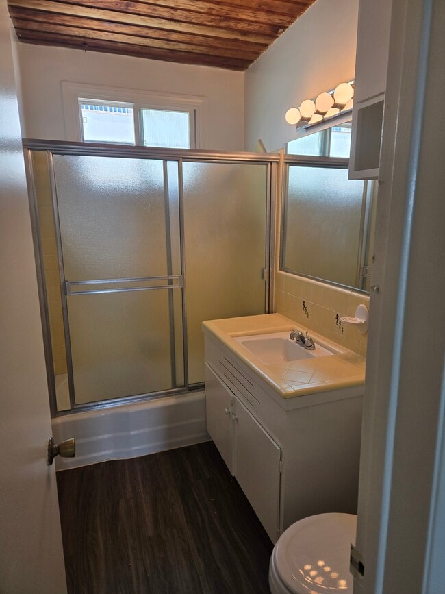Tiled Bathroom, vinyl plank flooring