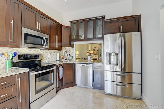 Building Photo - 8458 Boca Glades Blvd E