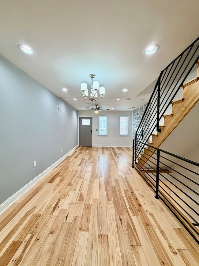 Photo - Modern 3-Bedroom Home with Rooftop Access, Finished Basement & Wet Bar