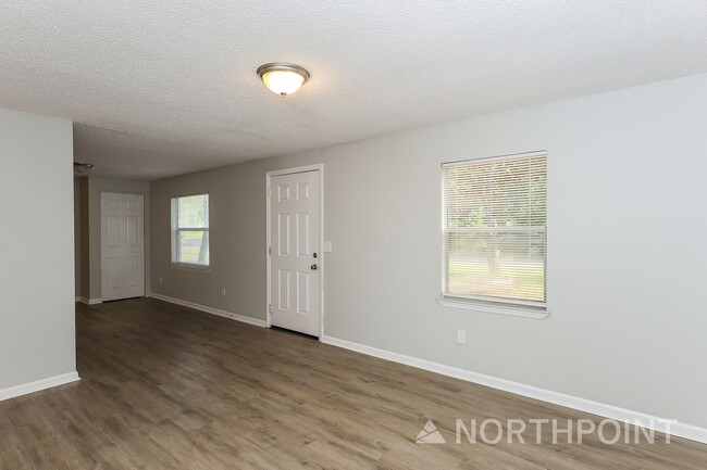 Photo - 3 BR/2BA | Newly Renovated Single Family Home | 1-Car Covered Parking | Front yard!