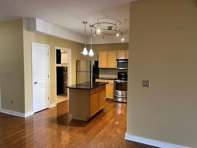 Photo - Sleek City Living: Oversized 2BR with Open...