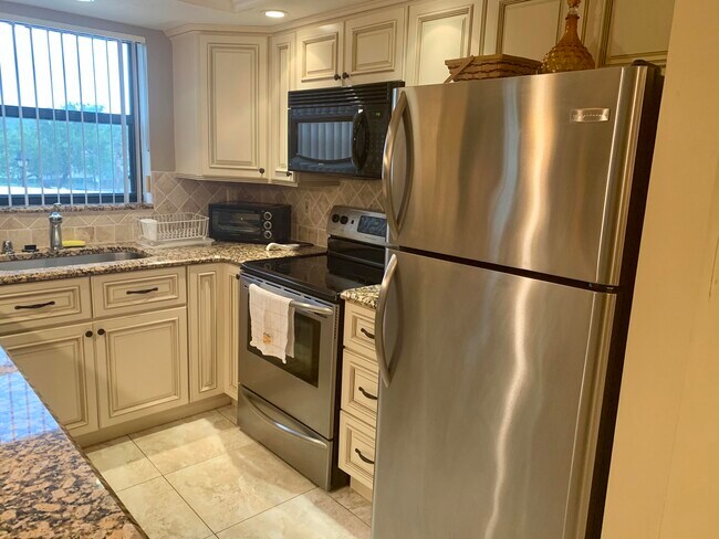 Photo - 600 Uno Lago Dr Unit 201