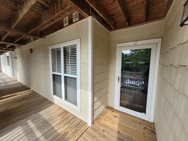 Photo - WATERFRONT - 3 Bed/2 Bath Condo - End Unit - Stunning View - Lake Access - Community Pool - Tenni...