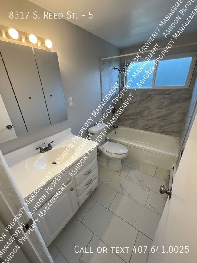 Building Photo - 8317 S Reed St Unit 5