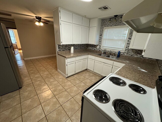 Photo - Spacious Home with Garage, Deck & Convenient Location