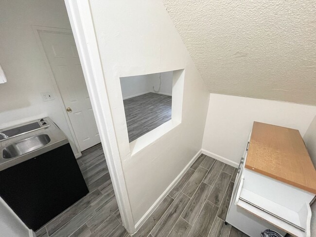 Photo - ALL Utilities included! Nicely updated studio with small kitchen, AC and Heater! Unit #1B