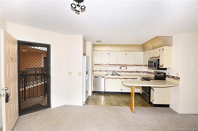 Photo - 1999 NE Collins Cir Unit 3-80