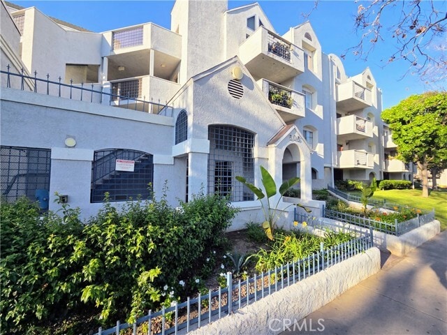 Building Photo - 505 W 5th St Unit 306