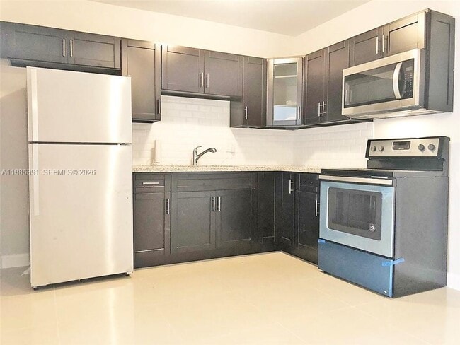 Building Photo - 7650 SW 10th Ct Unit A