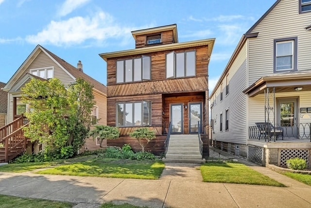 Building Photo - 4915 W Grace St Unit 2