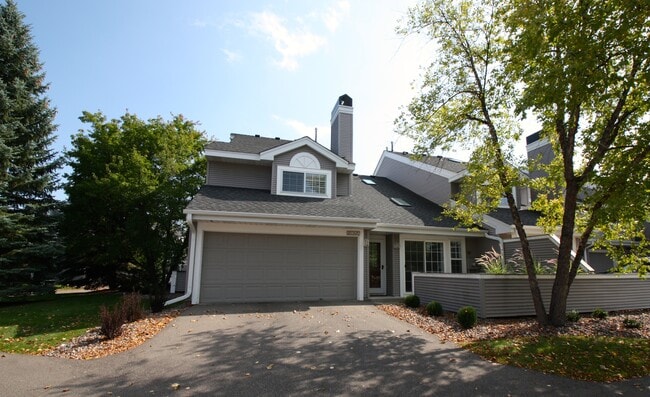 End unit townhome with attached double car garage. - 15805 24th Ave N.