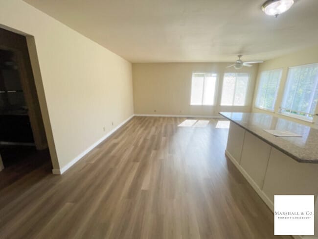 Photo - UPDATED AND BEAUTIFUL 2BR/1BA DUPLEX TOWNHOME, NEW WOOD FLOORING, PRIV. ENCLOSED BACK YARD, 2 CAR GA