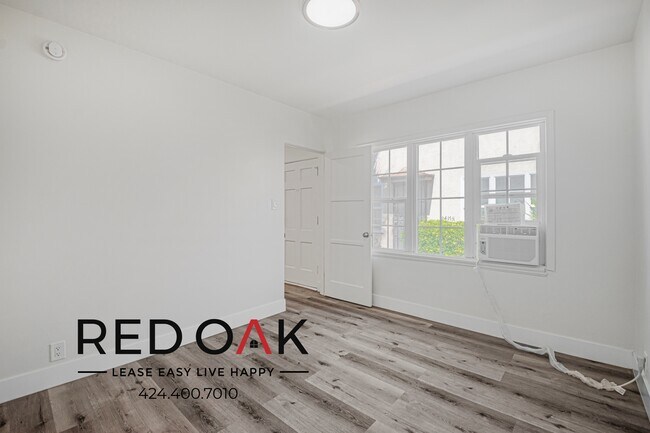 Building Photo - 2417 W Vernon Ave Unit 2421 1/2