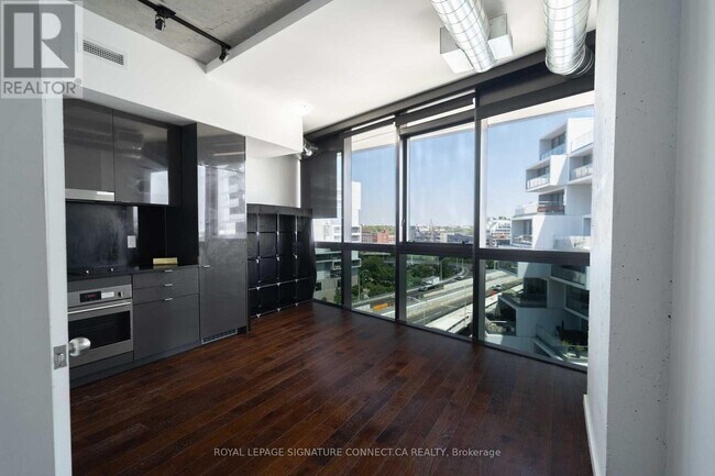Photo - 21 Lawren Harris Square Unit 910