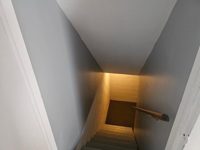 Stairs to basement - 1112 13th St S Unit 1112