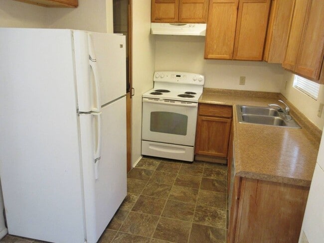 Photo - 2 bedroom, 1.5 bathroom, 2 Story Apartment in the Heart of Town