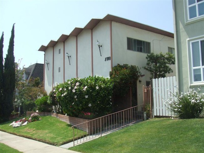 Building from street - 7711 W Manchester Ave